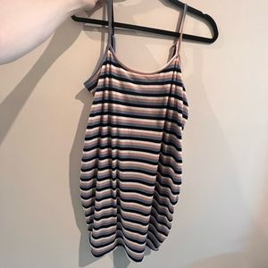 Pink, blue, black and white striped dress.